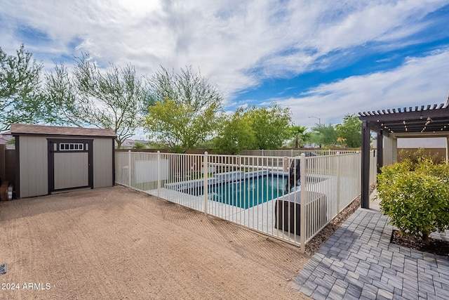 view of pool featuring a storage shed, a pergola, and a patio