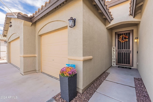 property entrance featuring a garage