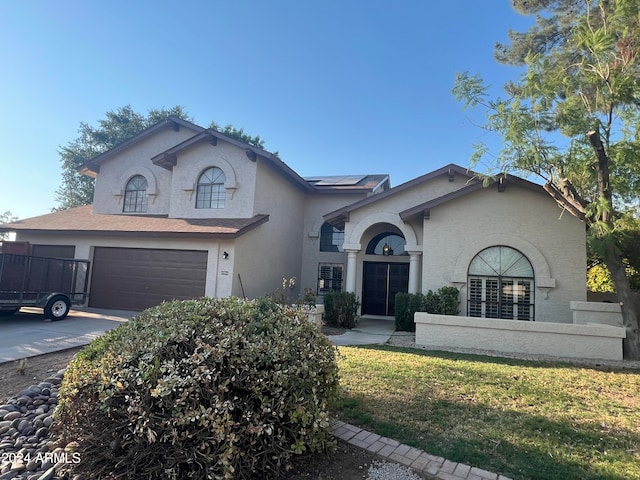 view of front of home featuring a garage