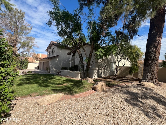 view of home's exterior featuring a lawn