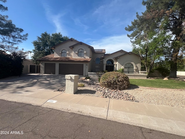 view of front of property featuring a garage