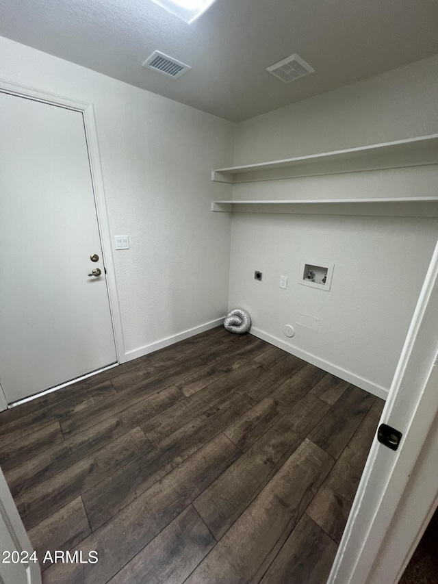 laundry room with washer hookup, dark wood finished floors, visible vents, electric dryer hookup, and laundry area