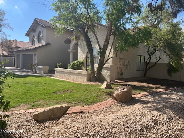 view of yard with a garage