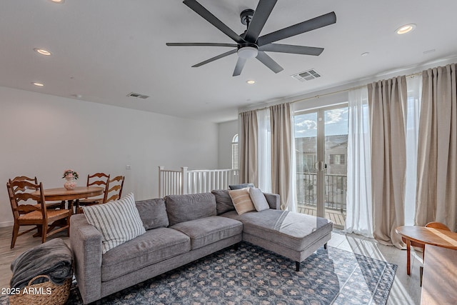 living room featuring ceiling fan