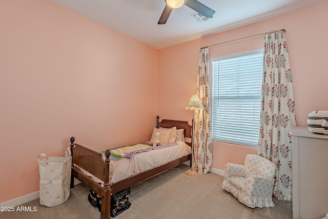 carpeted bedroom featuring ceiling fan