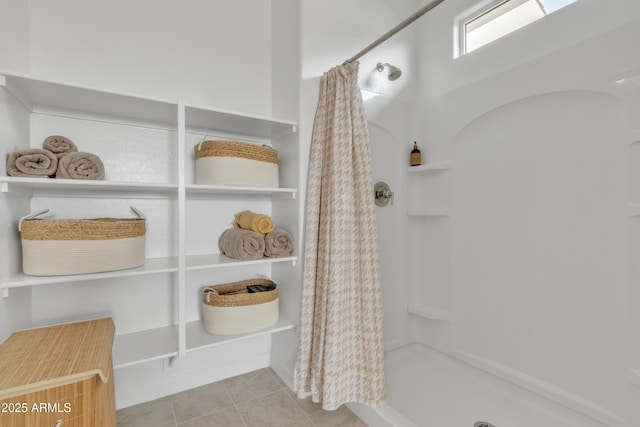 bathroom featuring a shower with curtain and tile patterned flooring
