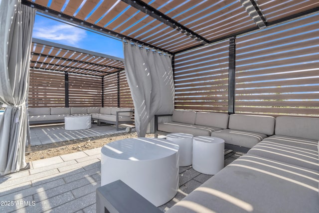 view of patio featuring outdoor lounge area and a pergola