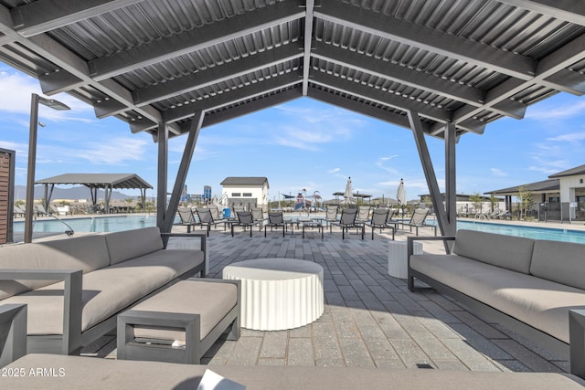 view of patio / terrace with an outdoor hangout area and a community pool