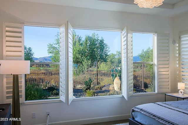 bedroom featuring multiple windows