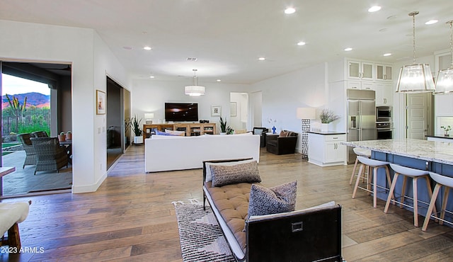 living room with hardwood / wood-style flooring