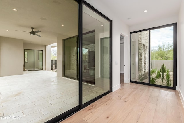 interior space featuring ceiling fan