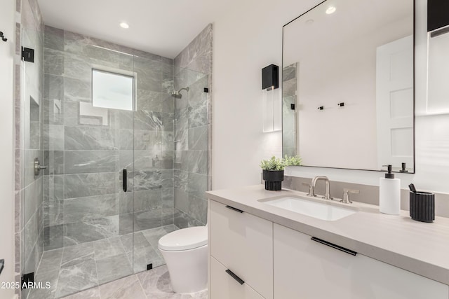 bathroom with recessed lighting, a shower stall, toilet, and vanity