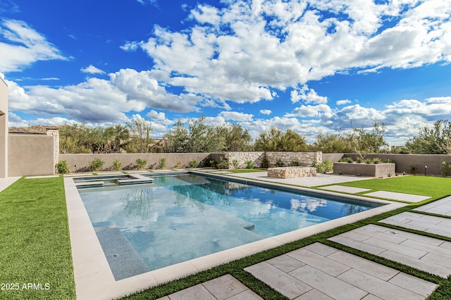 view of pool featuring a fenced in pool, a patio, a lawn, and a fenced backyard