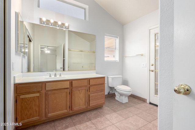 4336 E Aspen Ave, Mesa, AZ 85201 - bathroom featuring vaulted ceiling, vanity, ceiling fan, tile patterned floors, and an enclosed shower