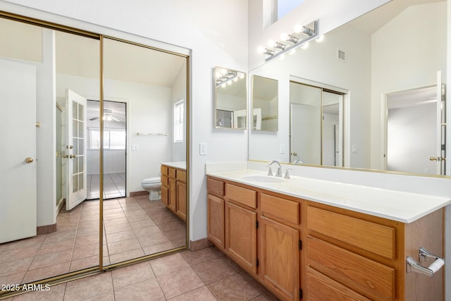 4336 E Aspen Ave, Mesa, AZ 85201 - bathroom with vanity, a high ceiling, and tile patterned flooring