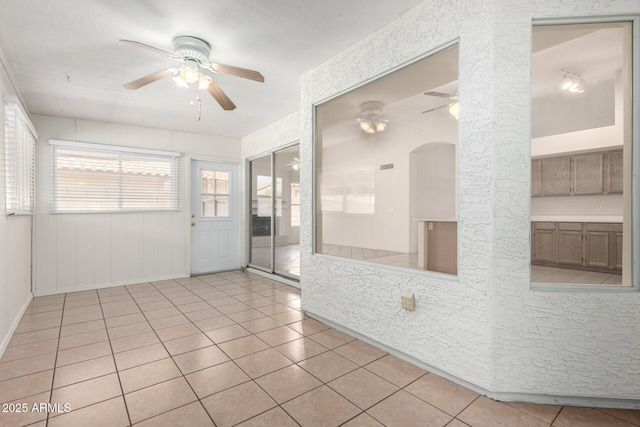 4336 E Aspen Ave, Mesa, AZ 85201 - unfurnished room with ceiling fan and light tile patterned flooring