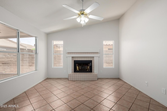 4336 E Aspen Ave, Mesa, AZ 85201 - unfurnished living room with lofted ceiling, a ceiling fan, a tile fireplace, and light tile patterned floors