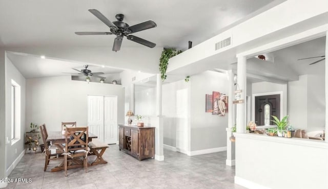 dining room featuring vaulted ceiling