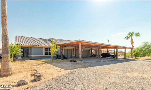 view of front of house with a carport