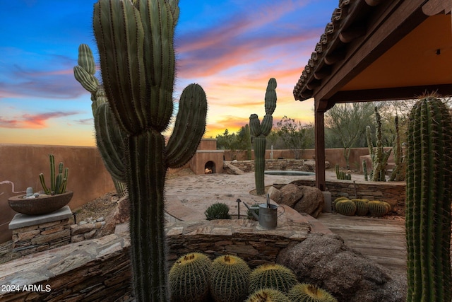 yard at dusk with a pool