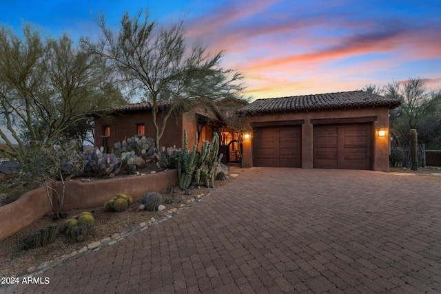 view of front of property featuring a garage