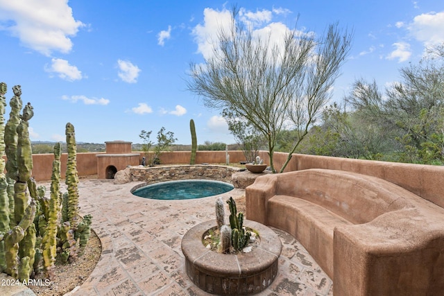 view of pool featuring a patio area