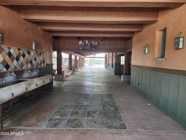 interior space featuring beam ceiling