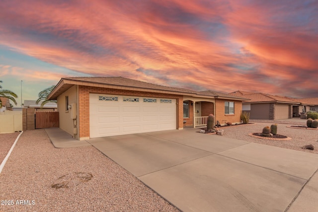 ranch-style home featuring a garage