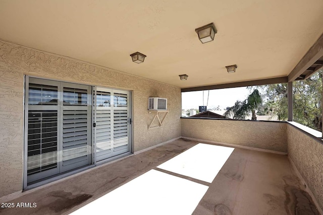 view of patio featuring a balcony