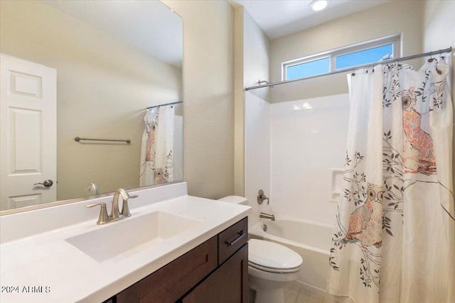 full bathroom with shower / tub combo with curtain, vanity, and toilet