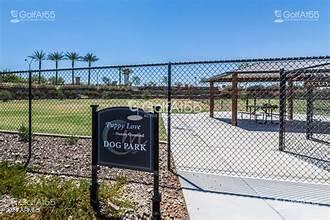 view of property's community featuring fence