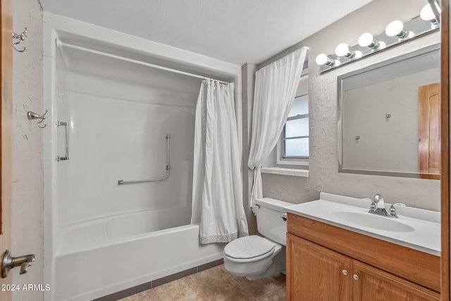 full bathroom with tile patterned flooring, shower / tub combo, vanity, and toilet