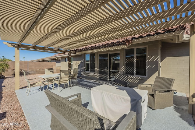 view of patio featuring a pergola