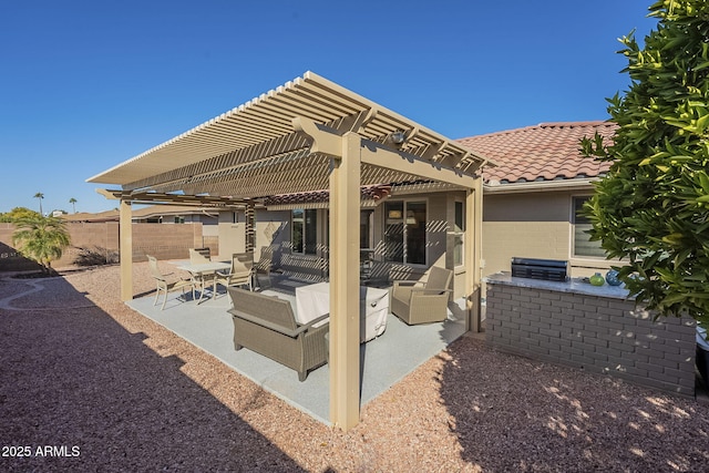 view of patio / terrace featuring area for grilling and a pergola