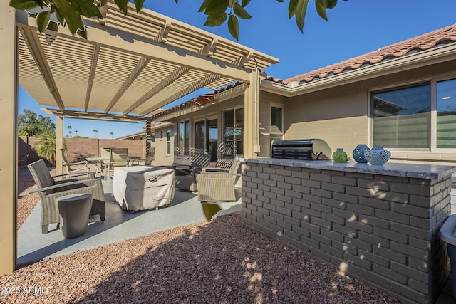 view of patio featuring a pergola