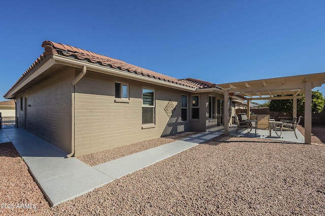 rear view of property with a patio area