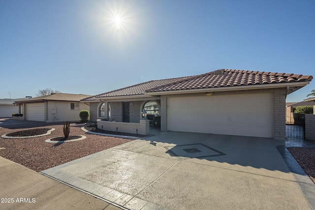 view of front of property with a garage