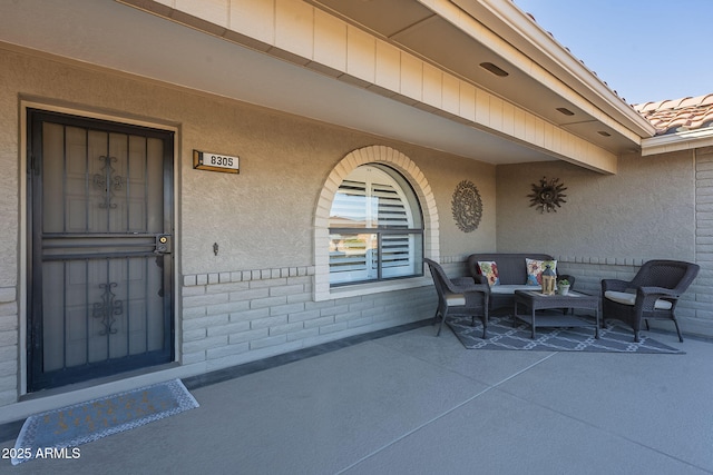 view of patio with an outdoor hangout area