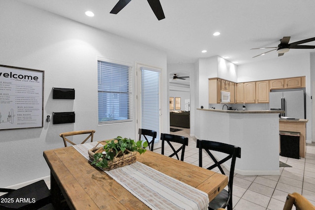 18161 N 63rd Ln, Glendale, AZ 85308 - dining area featuring a ceiling fan, baseboards, light tile patterned floors, and recessed lighting