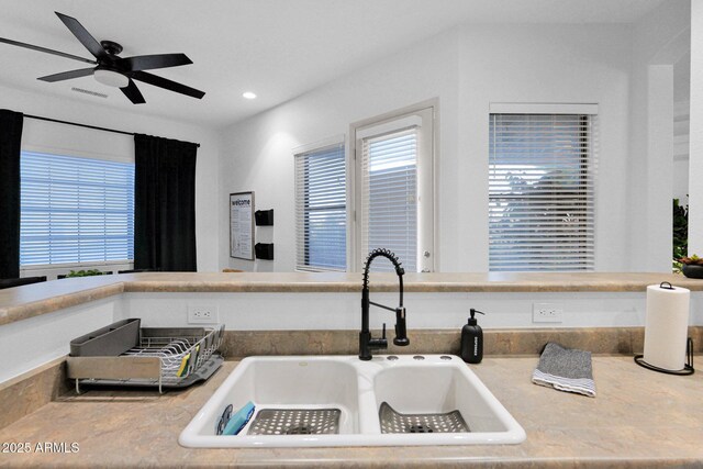 18161 N 63rd Ln, Glendale, AZ 85308 - kitchen with a ceiling fan, a wealth of natural light, visible vents, and a sink