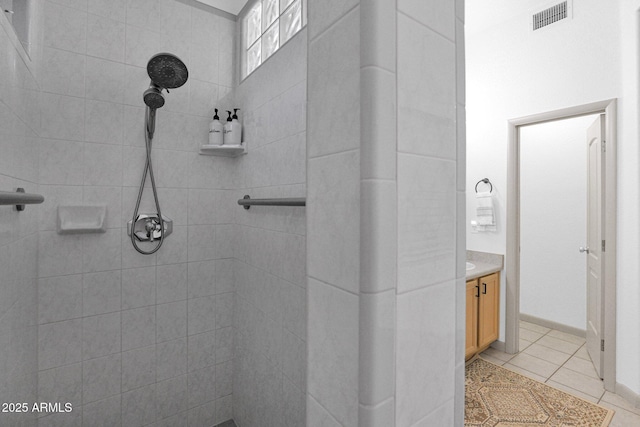 18161 N 63rd Ln, Glendale, AZ 85308 - bathroom featuring vanity, tile patterned flooring, visible vents, and a tile shower