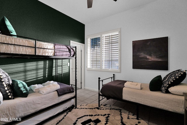 18161 N 63rd Ln, Glendale, AZ 85308 - bedroom with baseboards, tile patterned flooring, ceiling fan, and vaulted ceiling