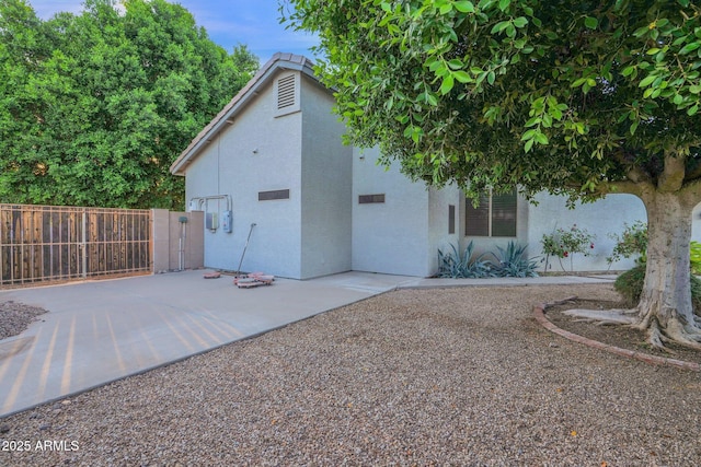 18161 N 63rd Ln, Glendale, AZ 85308 - rear view of house with fence and stucco siding