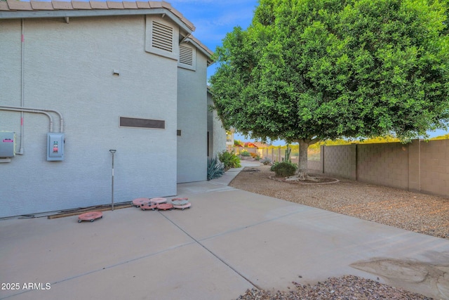 18161 N 63rd Ln, Glendale, AZ 85308 - rear view of house featuring a fenced backyard, a patio area, and stucco siding