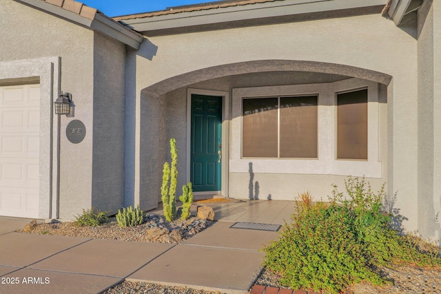 18161 N 63rd Ln, Glendale, AZ 85308 - property entrance with stucco siding and a garage