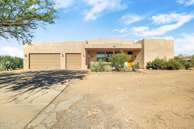 adobe home with a garage