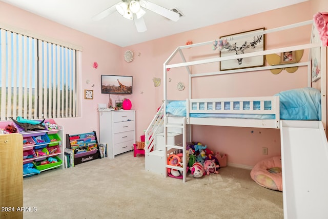 bedroom with ceiling fan and carpet floors