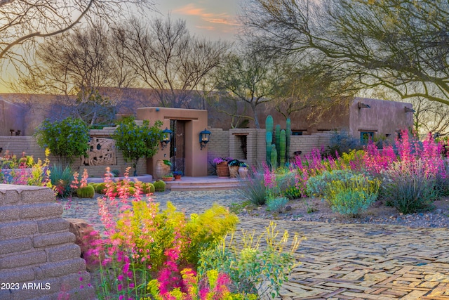 view of adobe home