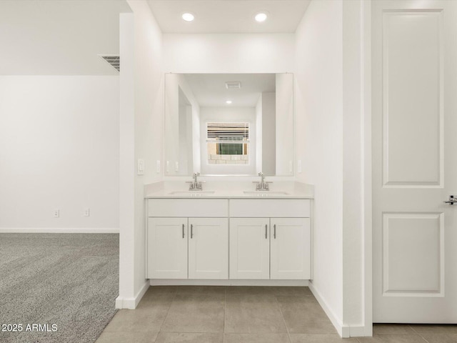 bathroom featuring tile patterned floors and vanity