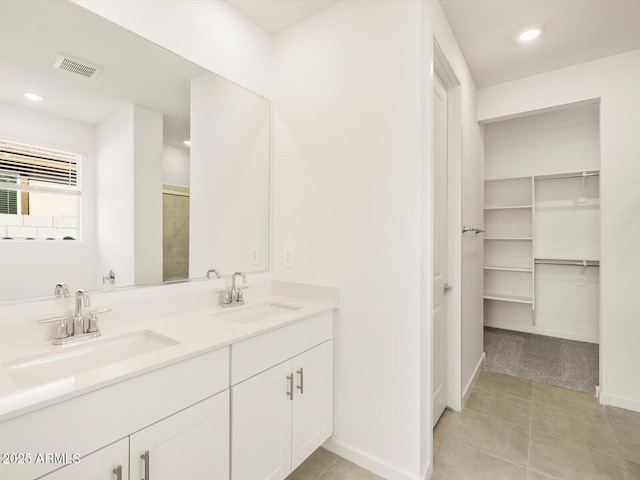 bathroom featuring vanity and tile patterned floors